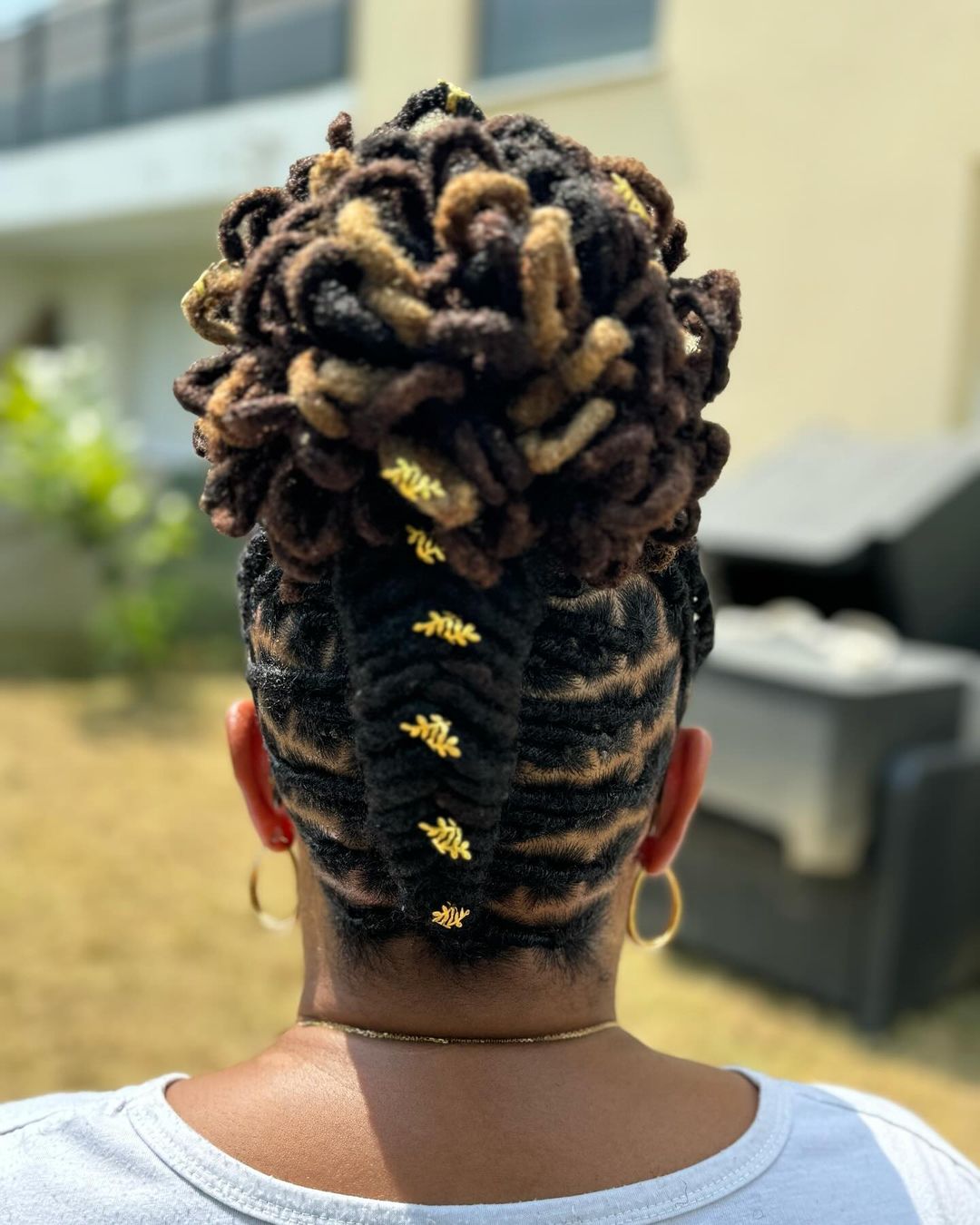 flat twist loc unique petal bun style