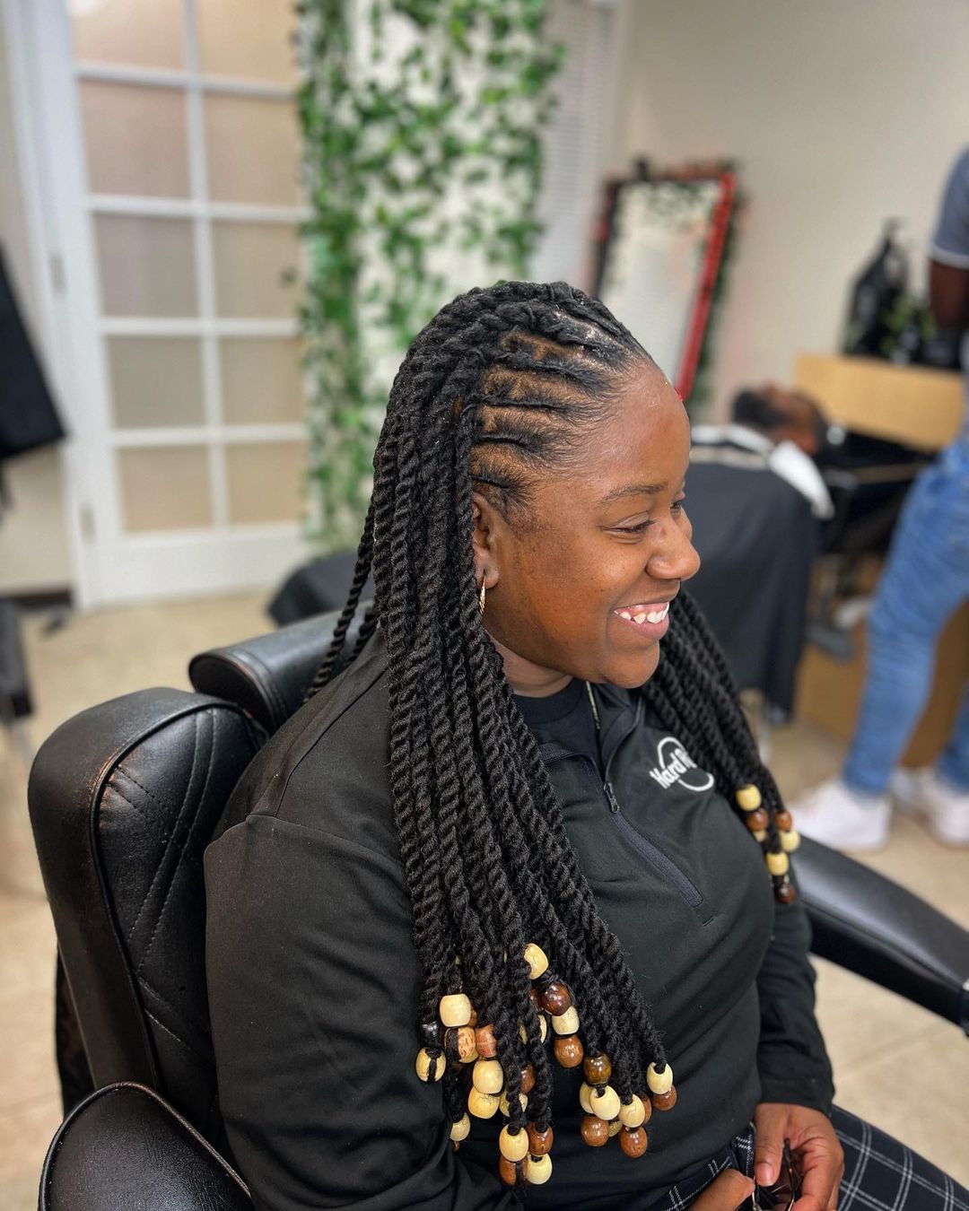 half-up half-down flat twist locs with hair cuffs