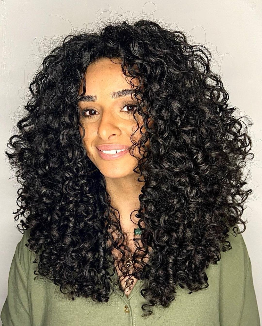 layered curly hair