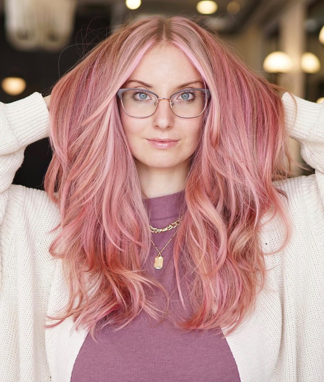 layered pastel pink hair with light pink money piece