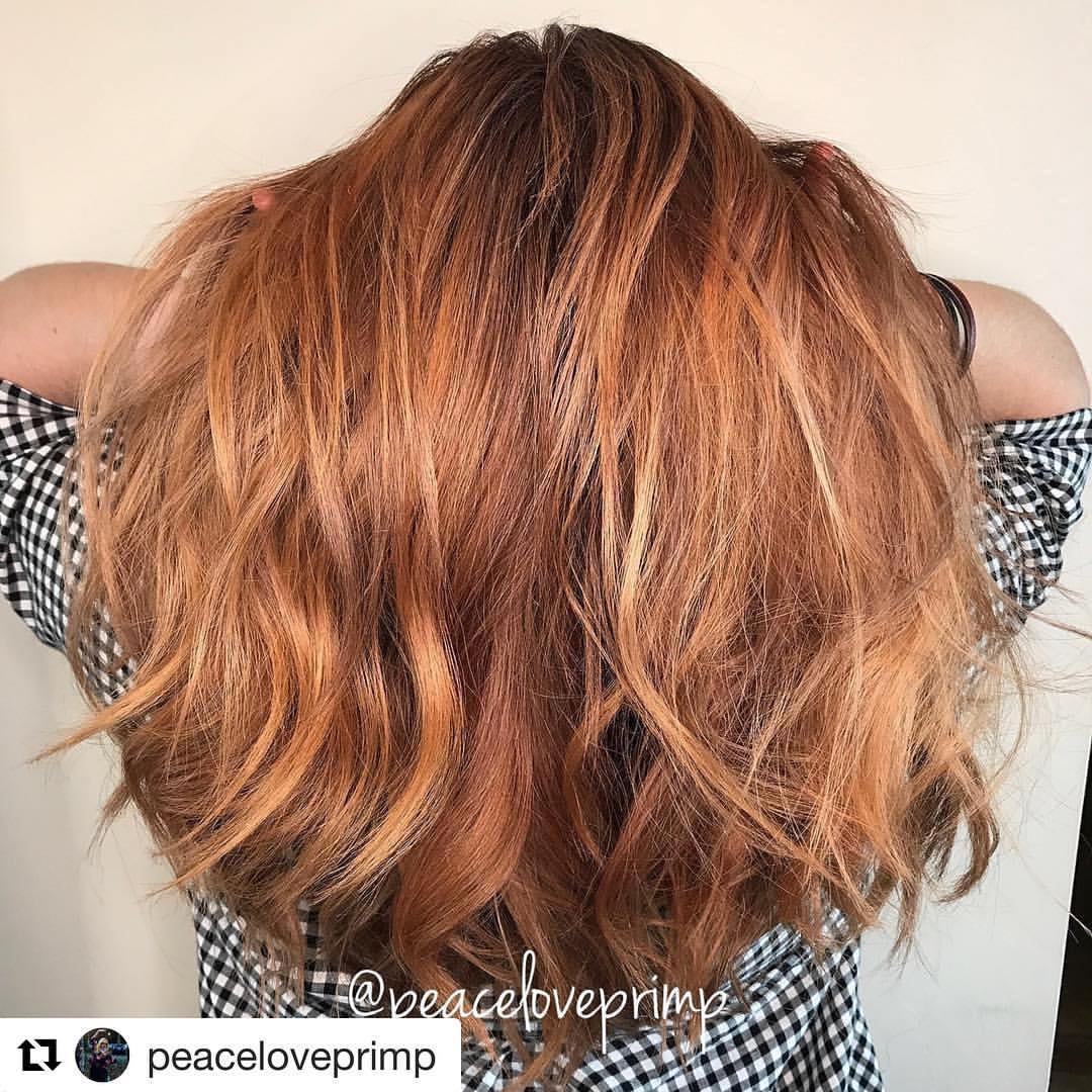 light auburn lengths with brunette roots messy hairstyle