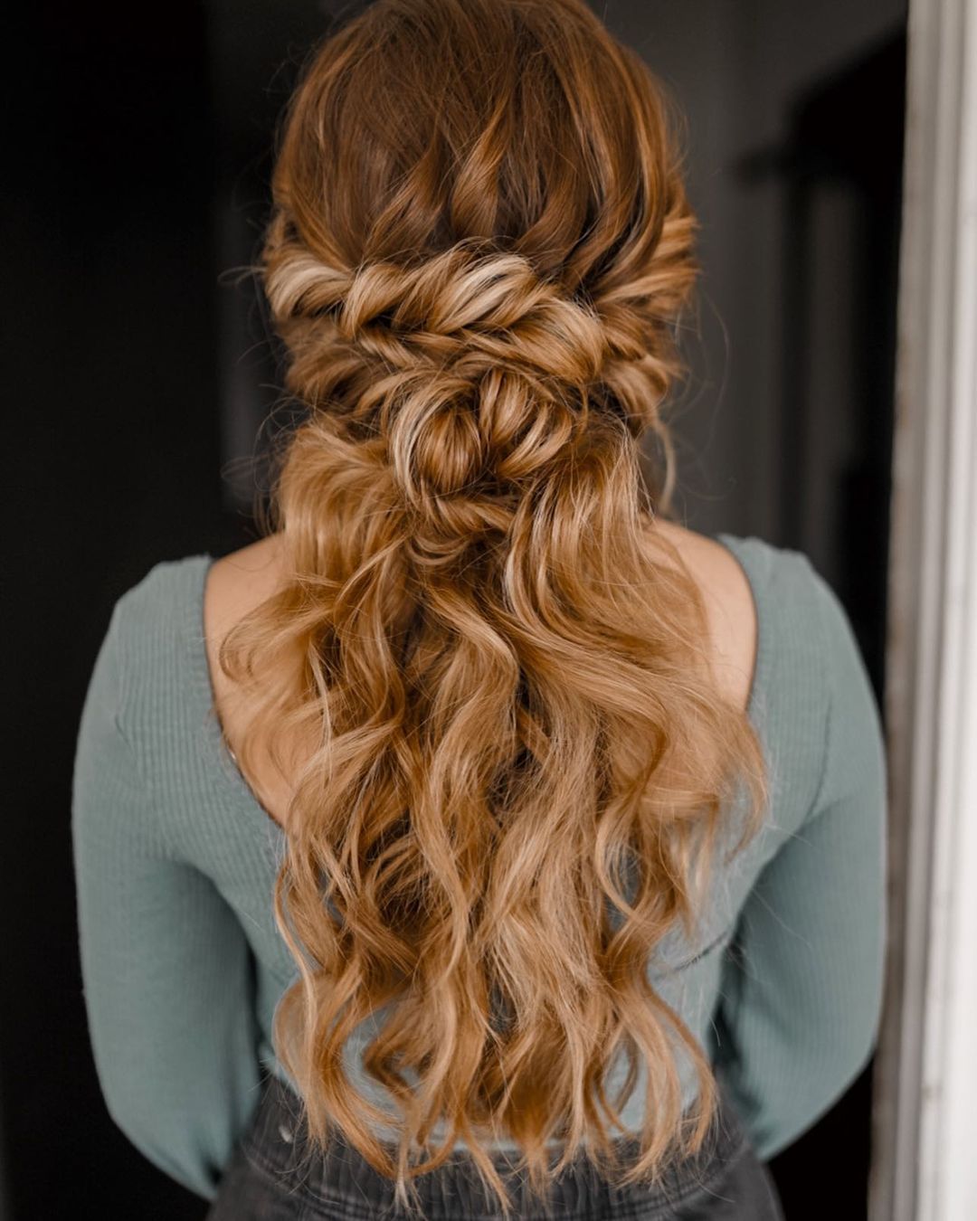 messy half-up braided bun style