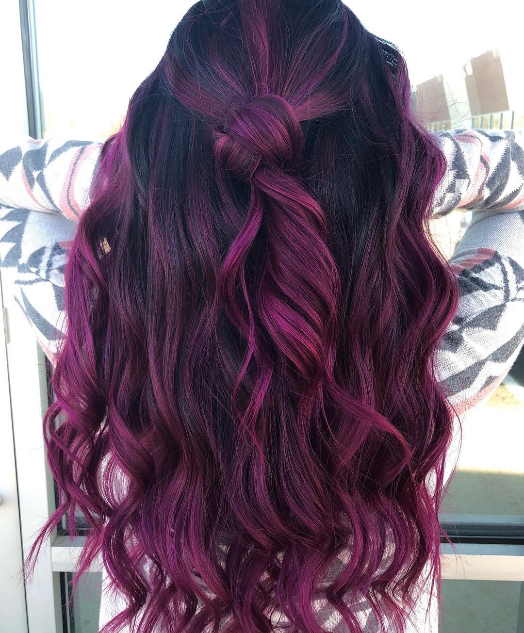 metallic fuchsia highlights on black hair