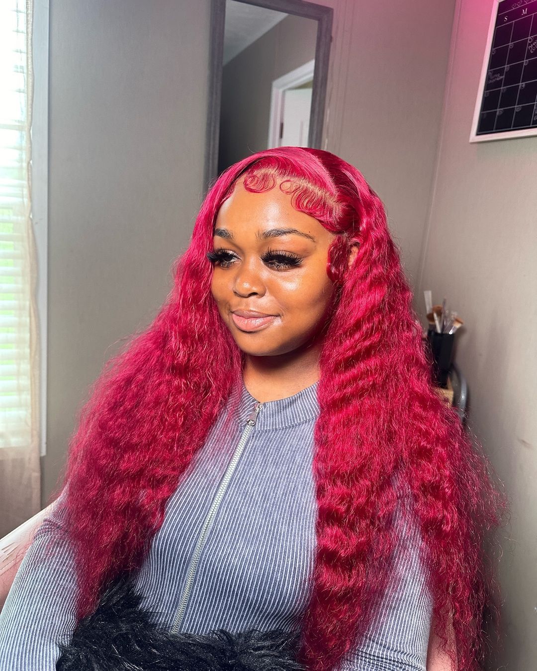 red pink weave fluffy hairstyle with laid edges