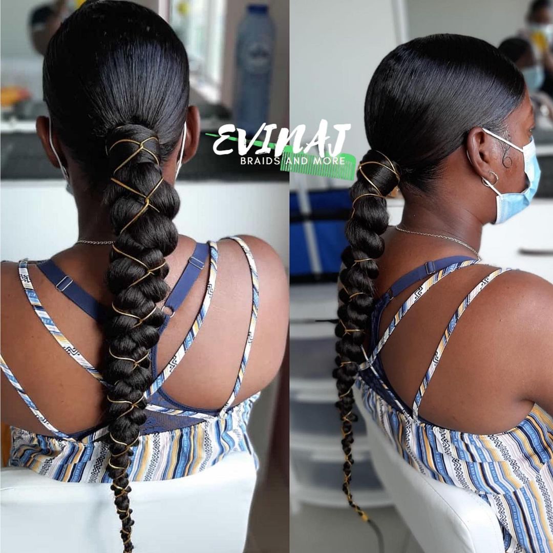 sleek braided ponytail with golden strings