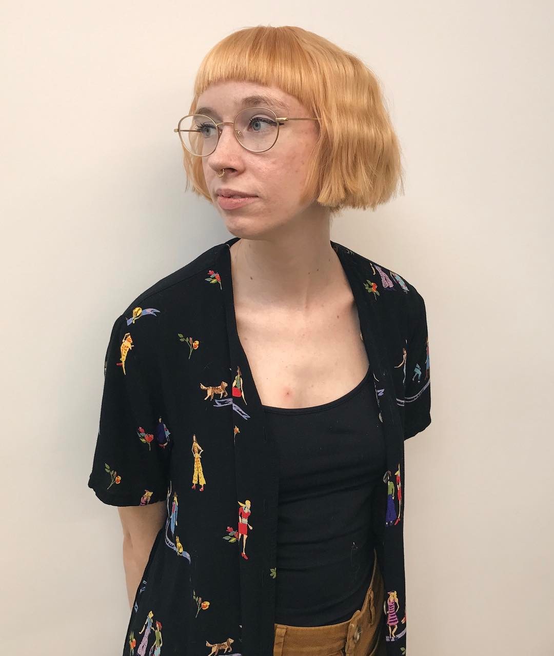 strawberry blonde bob with short fringe