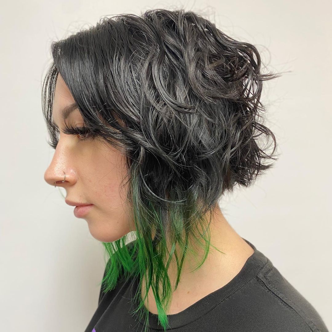 wavy black bob with green tips