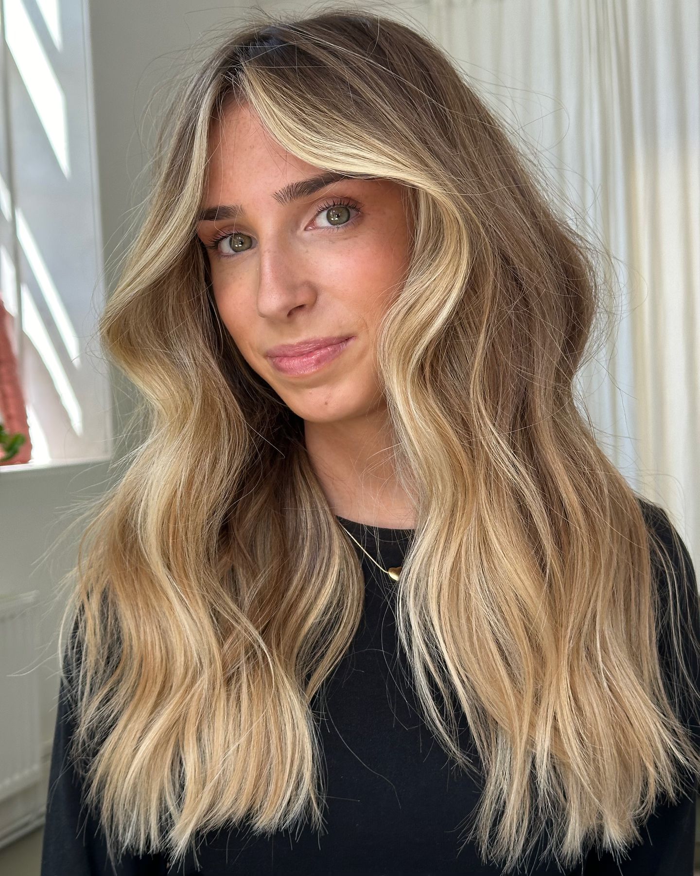 sandy blonde with vanilla highlights