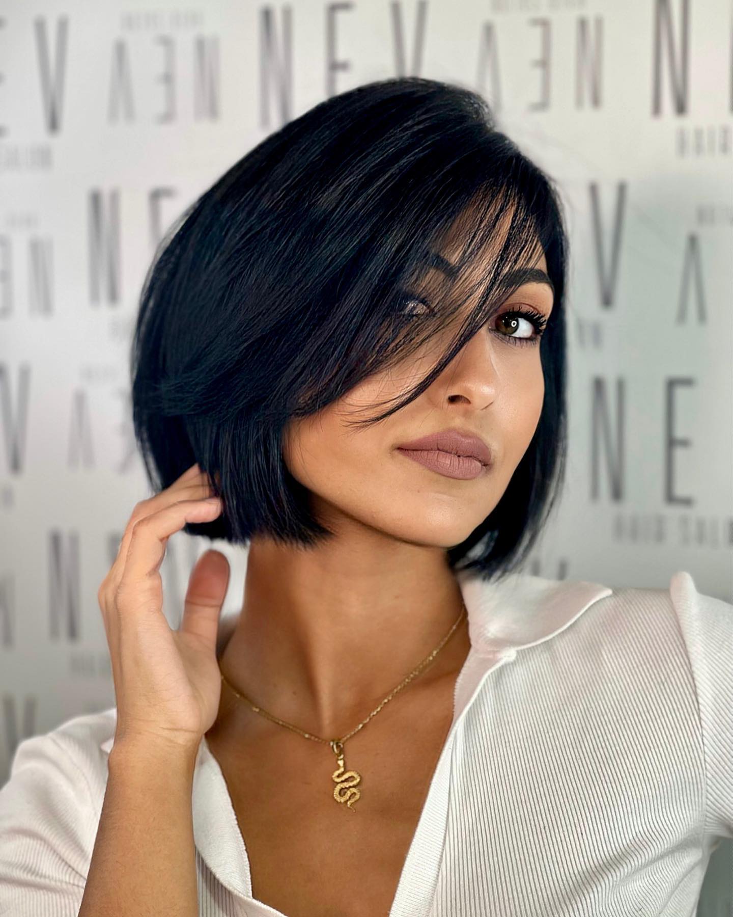 layered bob with long wispy bangs