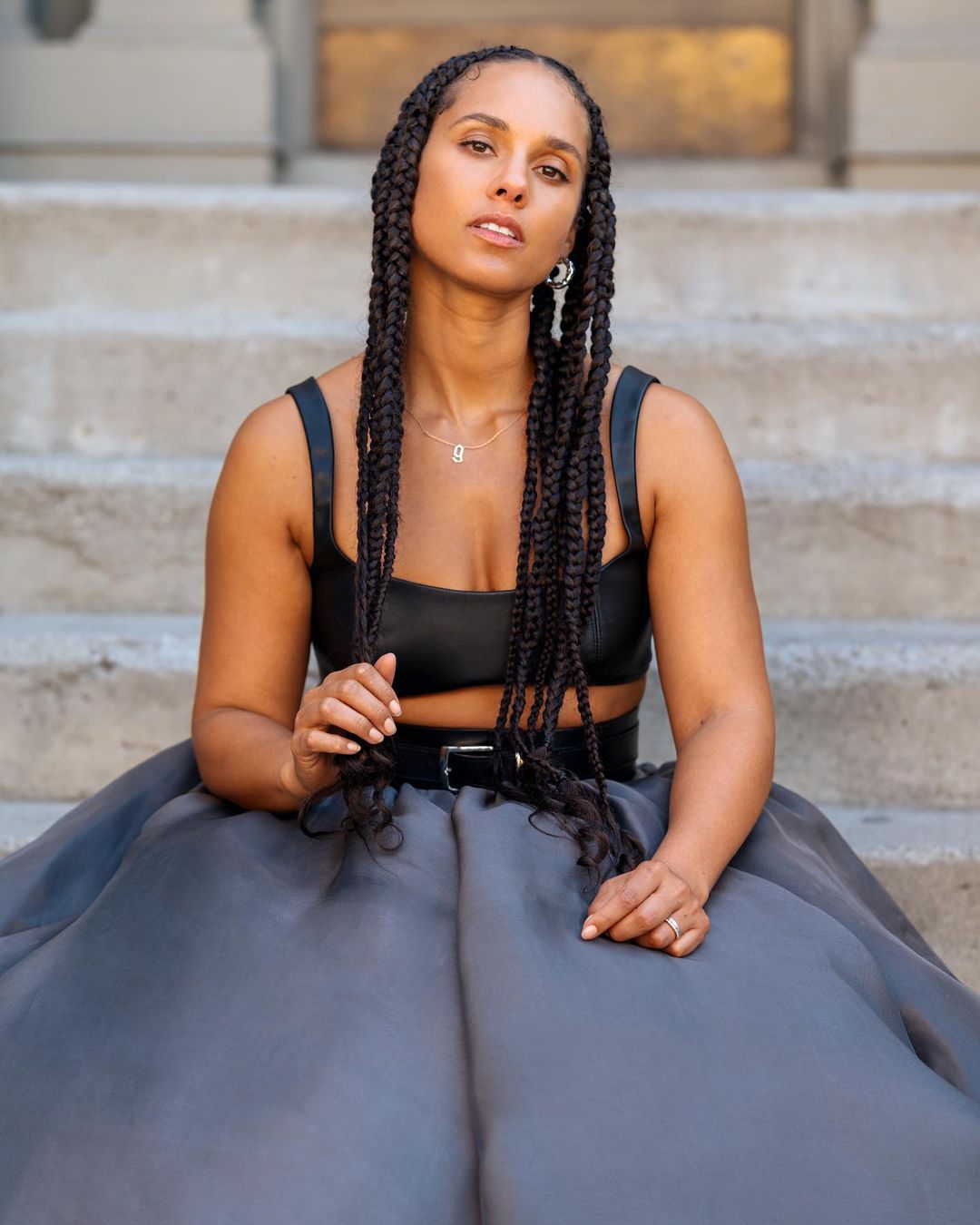 Alicia Keys met Fulani vlechten met gekrulde uiteinden