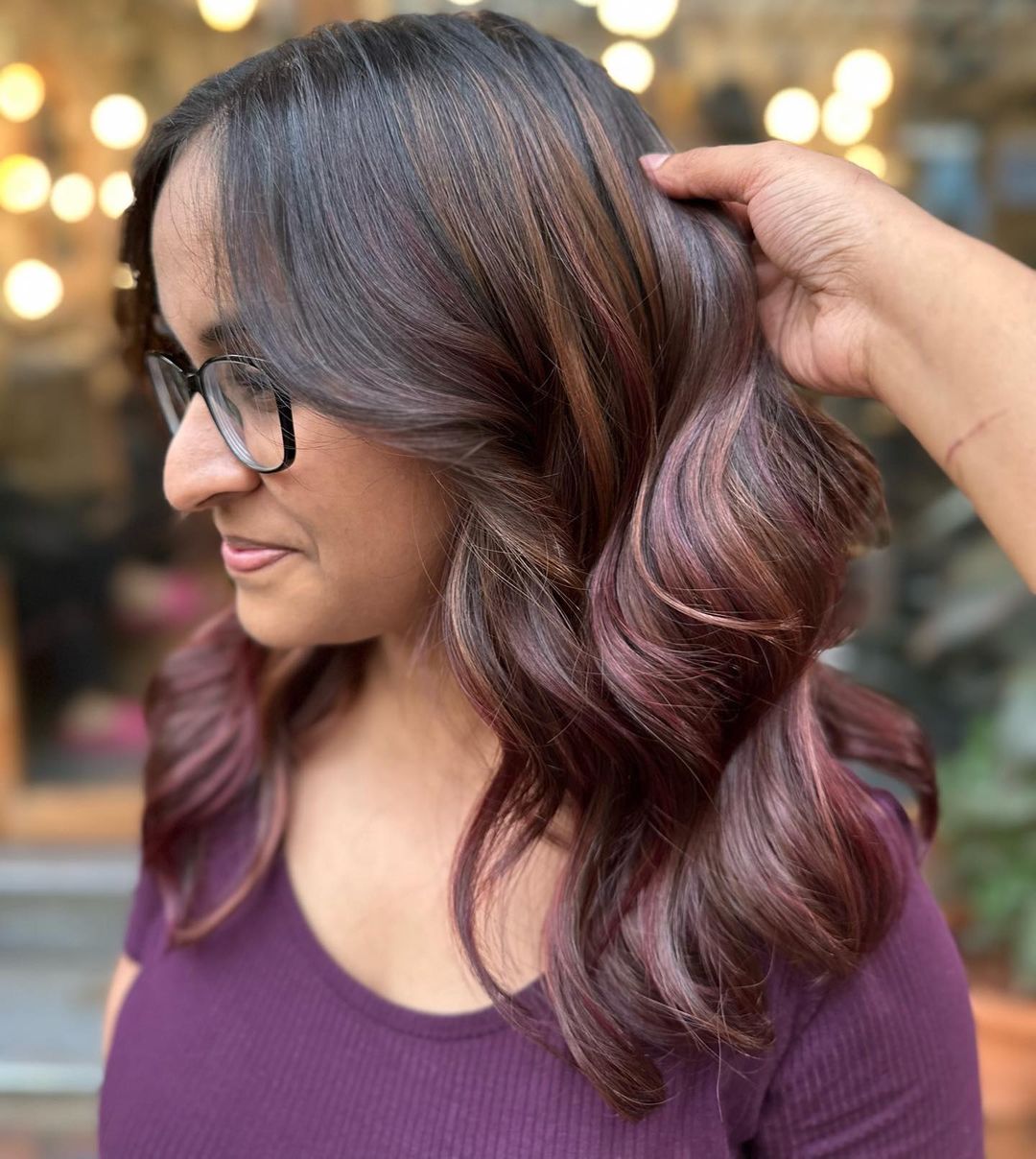 Warm chocolate brown with some cherry -burgundy Balayage