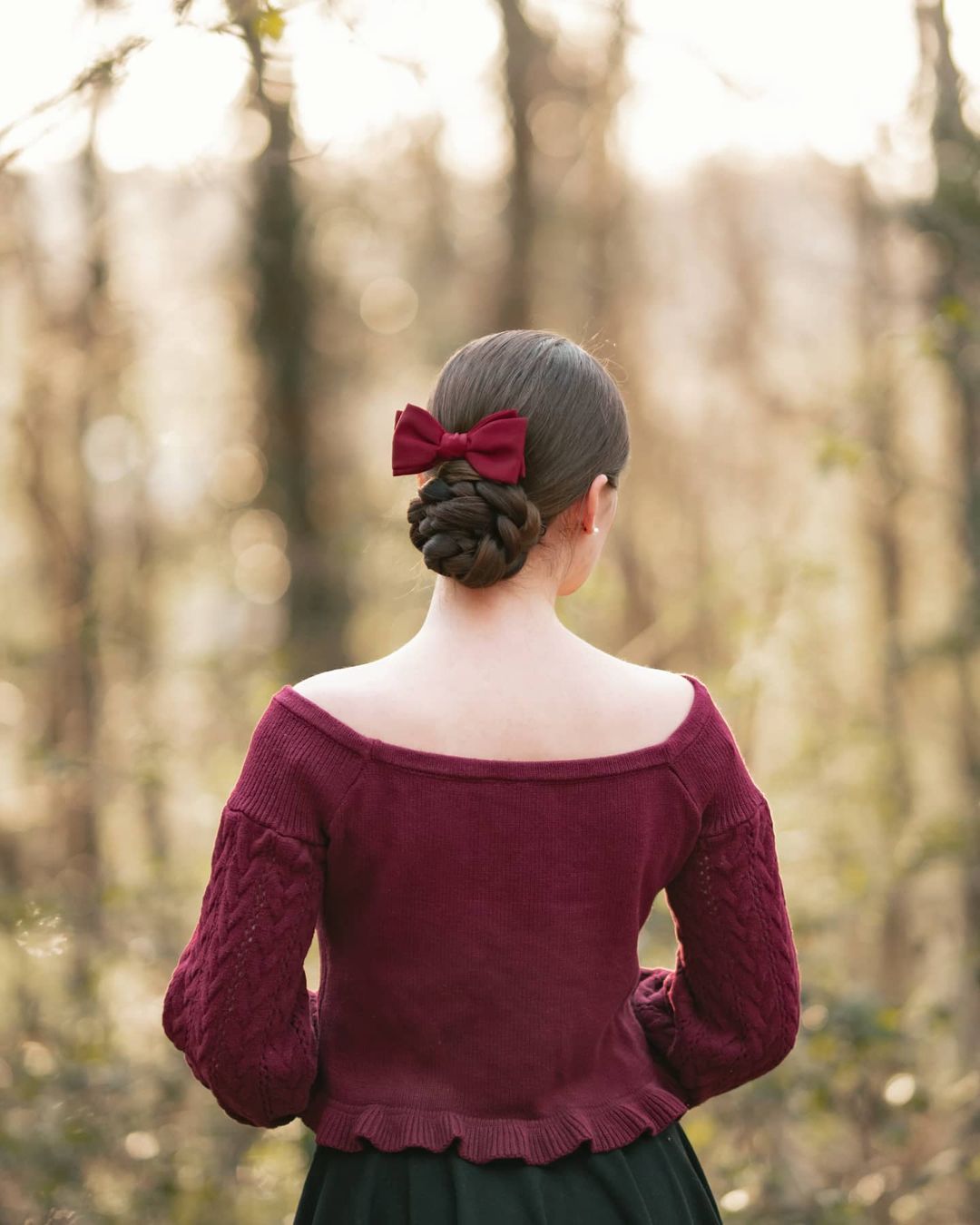 braided bun with a bow