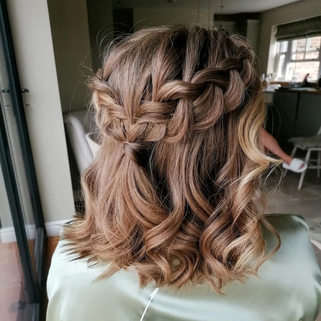 braided half updo with soft waves