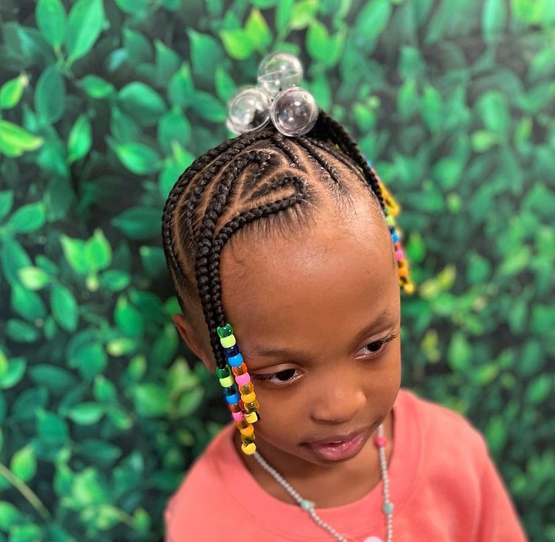 braided ponytail with beads and cornrows