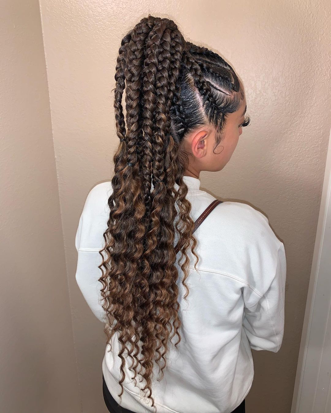 braided ponytail with curly ends