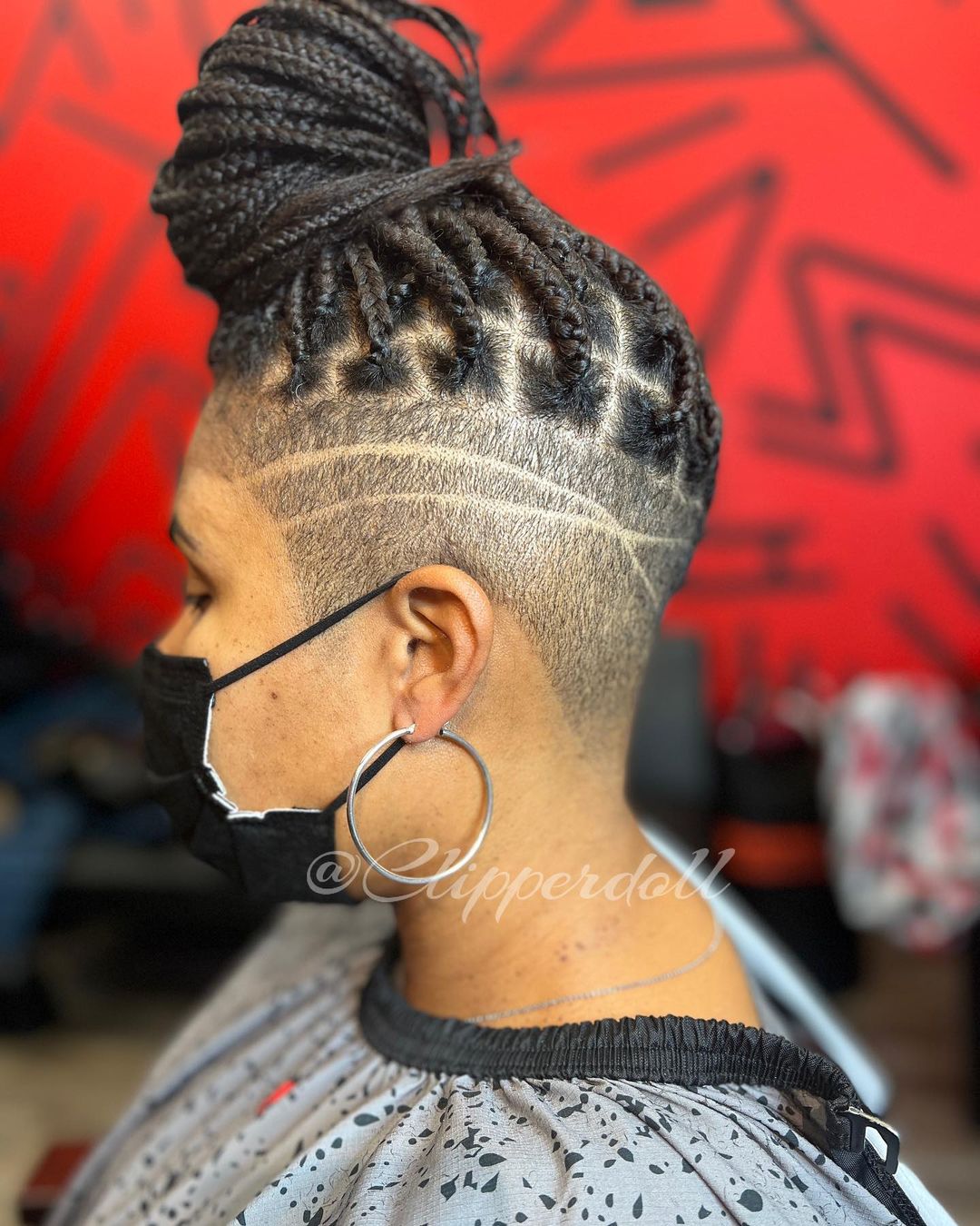 braided top knot with freestyle shaved design