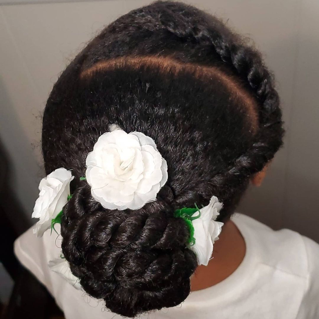 braided updo bun with flowers