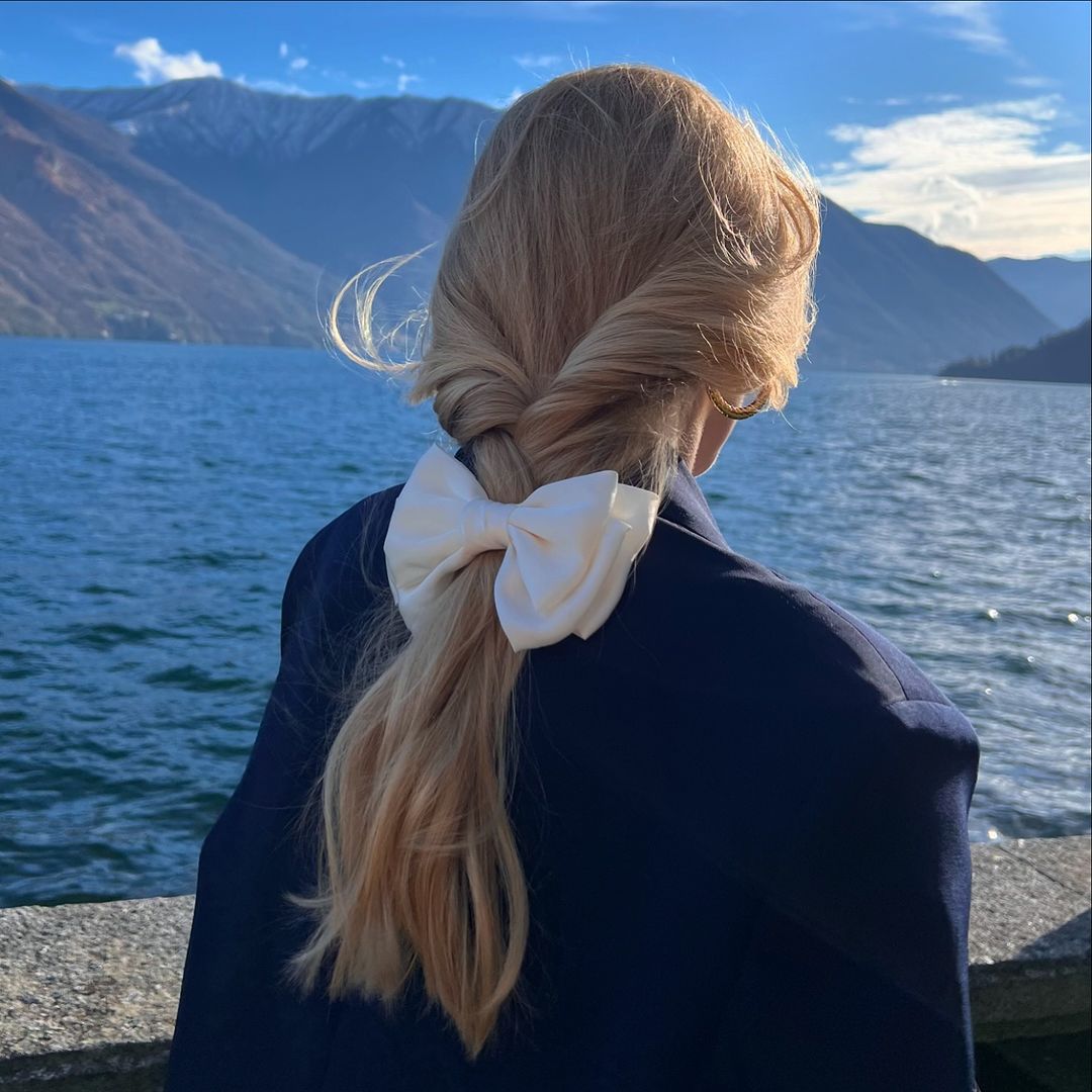 casual braid pony hairstyle with a bow