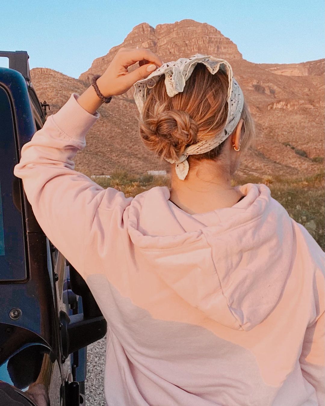 casual low bun with a bandana