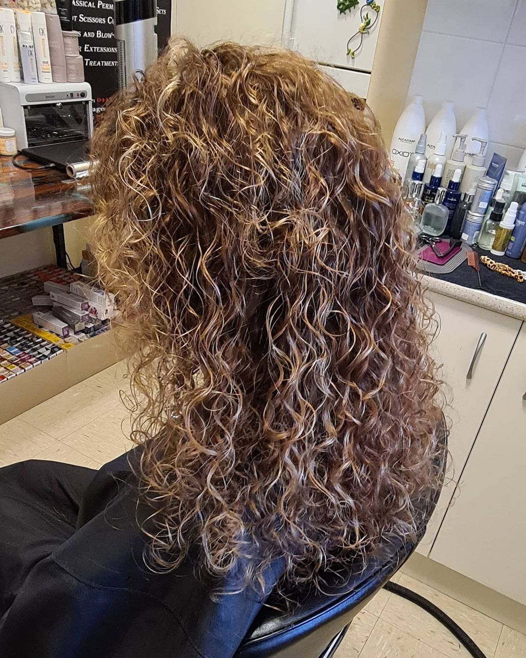 chestnut brown and honey blonde curls