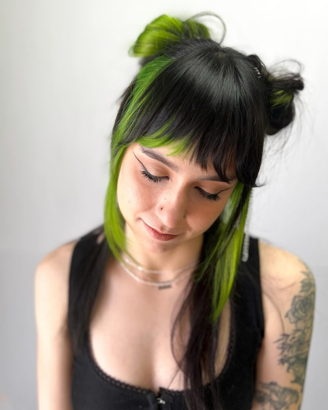 colorblock neon green black half-up space buns