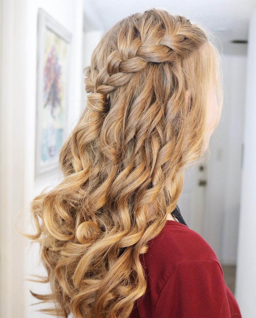 curly braided half-up hairstyle