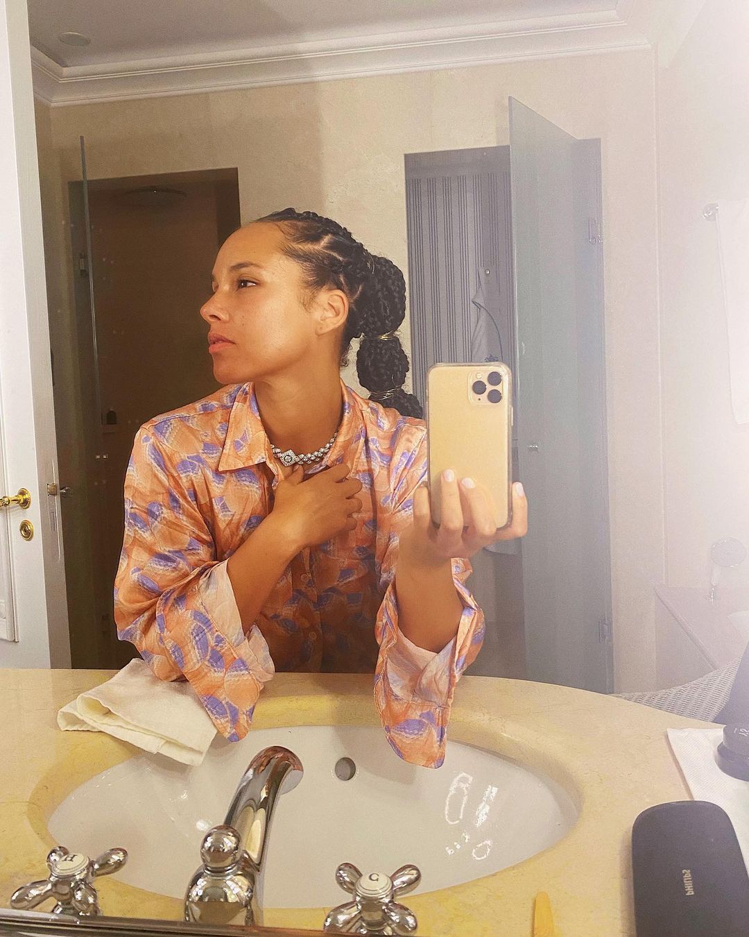 fulani braids into a bubble braid with zig zag parting Alicia Keys