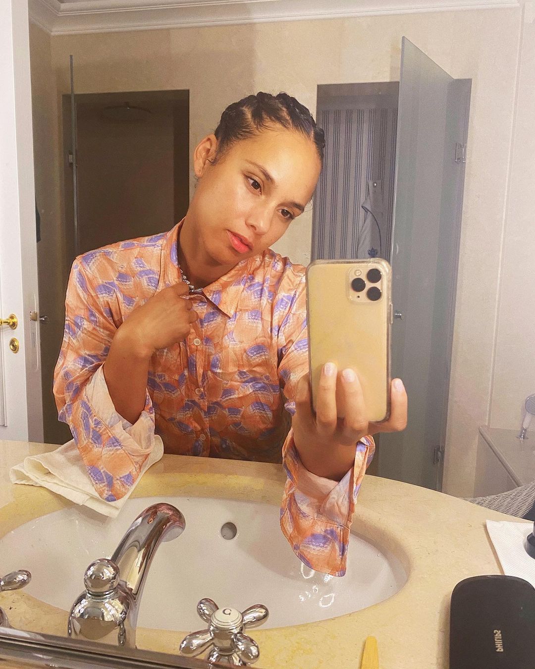 tresse fulani en bulle avec raie en zig zag Alicia Keys