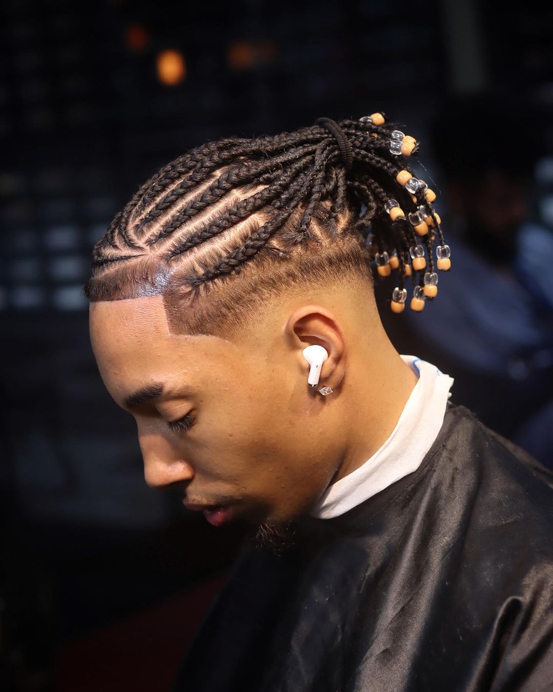 fulani braids with beads into ponytail