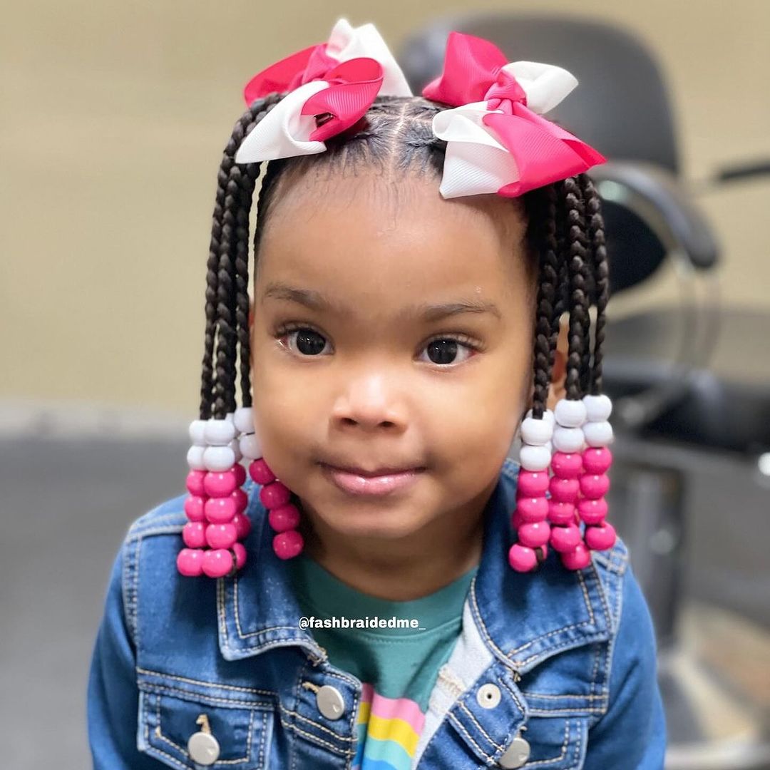 half-up two ponytails with heart cornrows