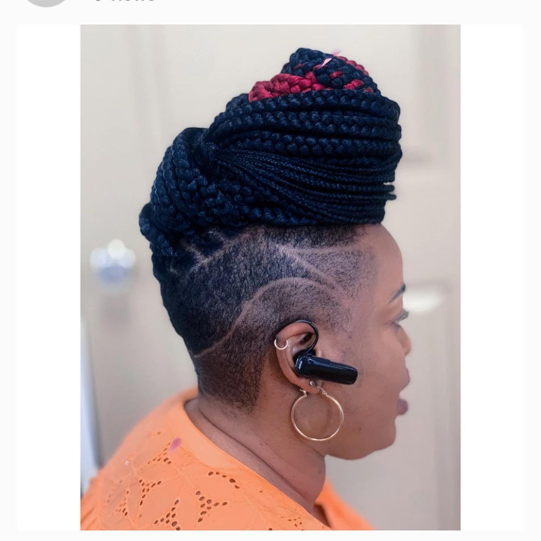 knotless braids massive top knot with freestyle shaved design