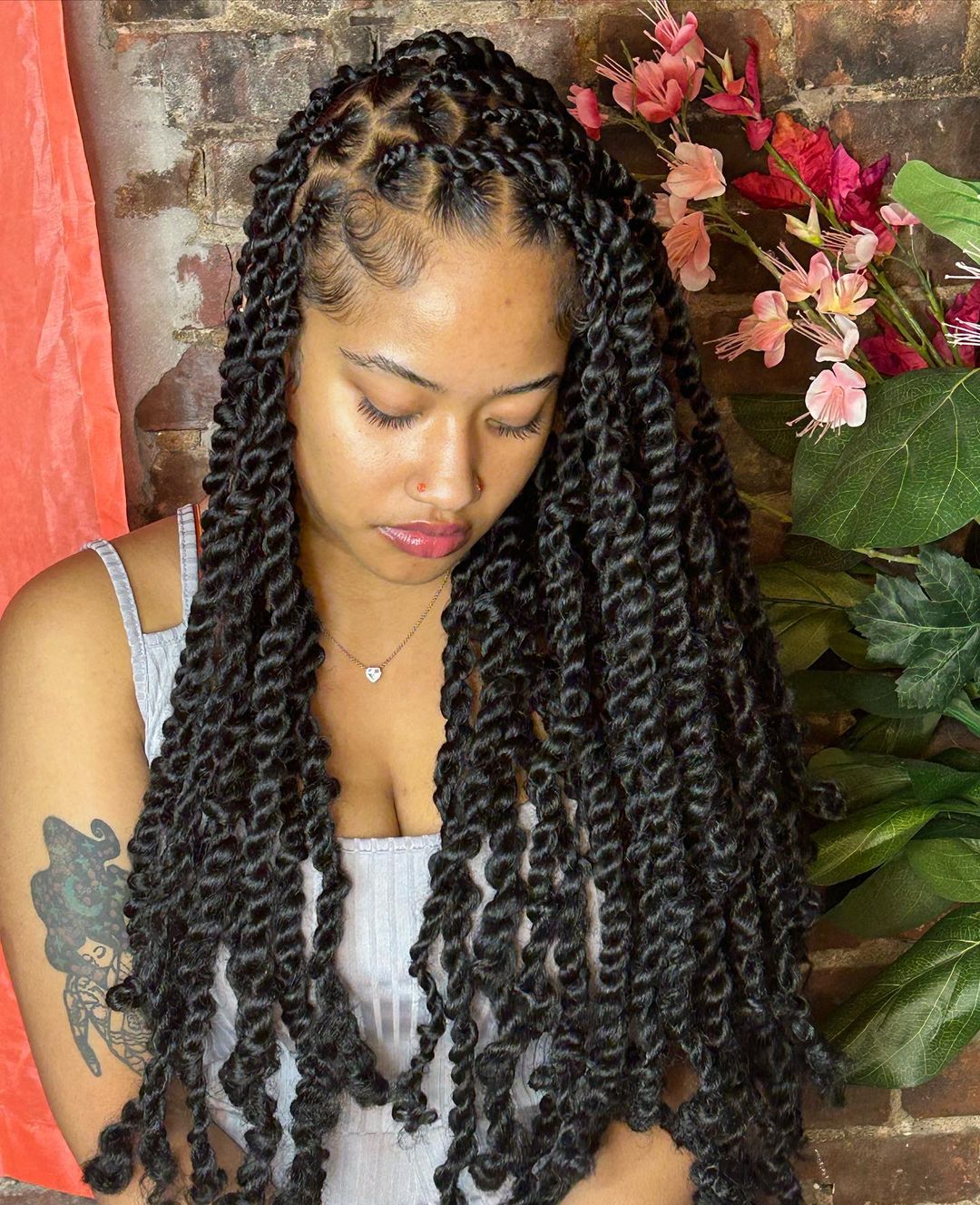 long passion twists with a deep side part