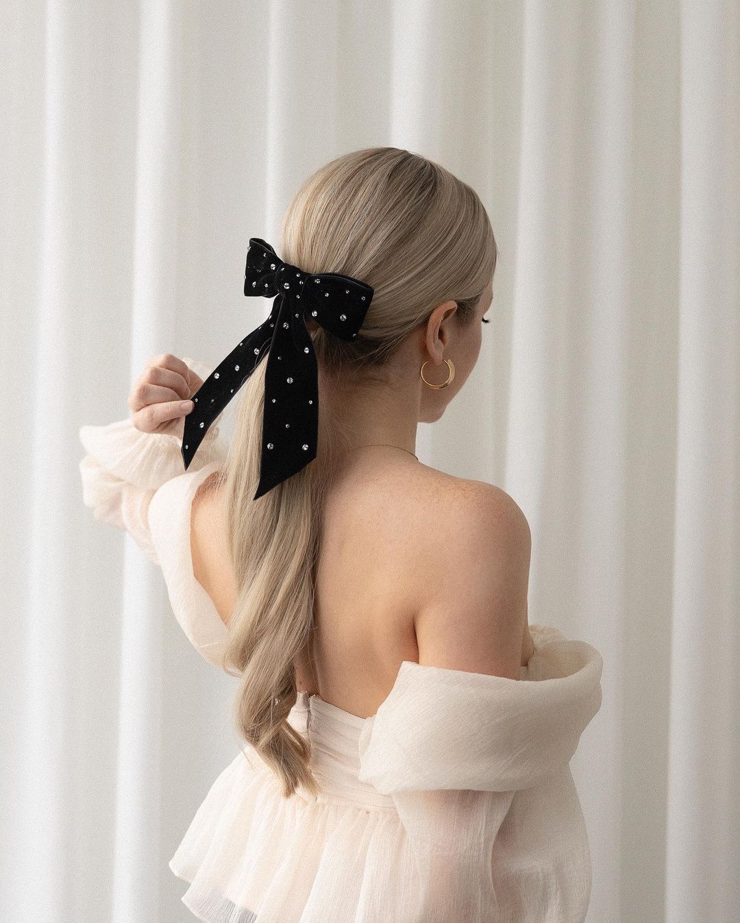 low ponytail with a bow