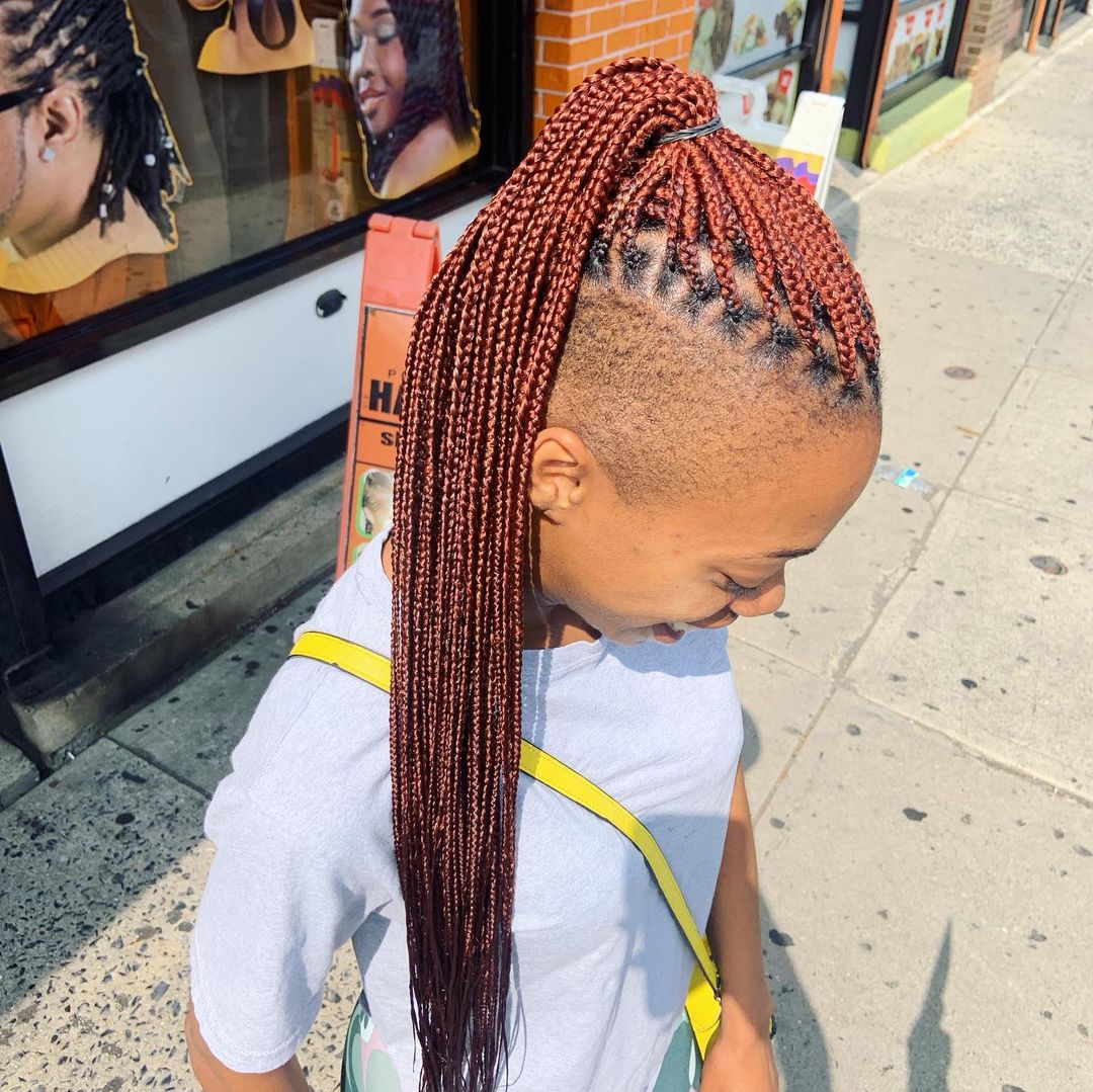 mahogany knotless box braids with shaved sides ponytail hairstyle