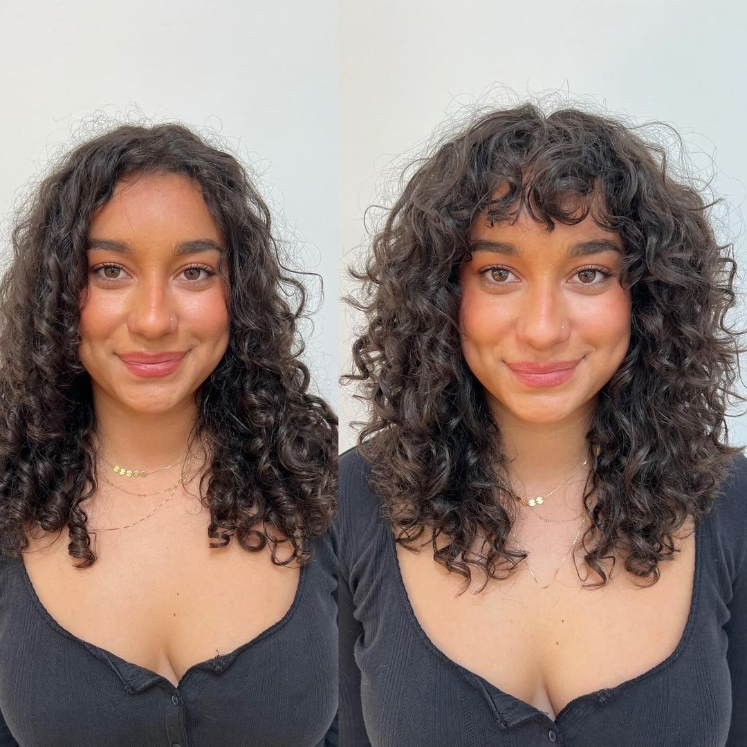 medium curly haircut with bangs