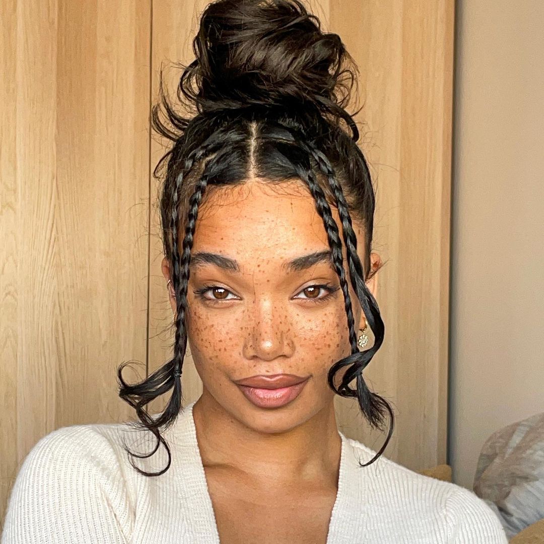 messy top knot with frontal small braids