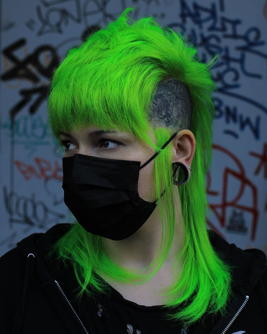 neon green shaggy mullet with an undercut