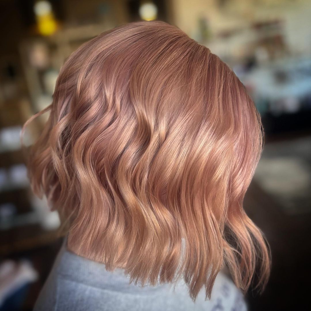 glossed pastel rose gold tousled waves