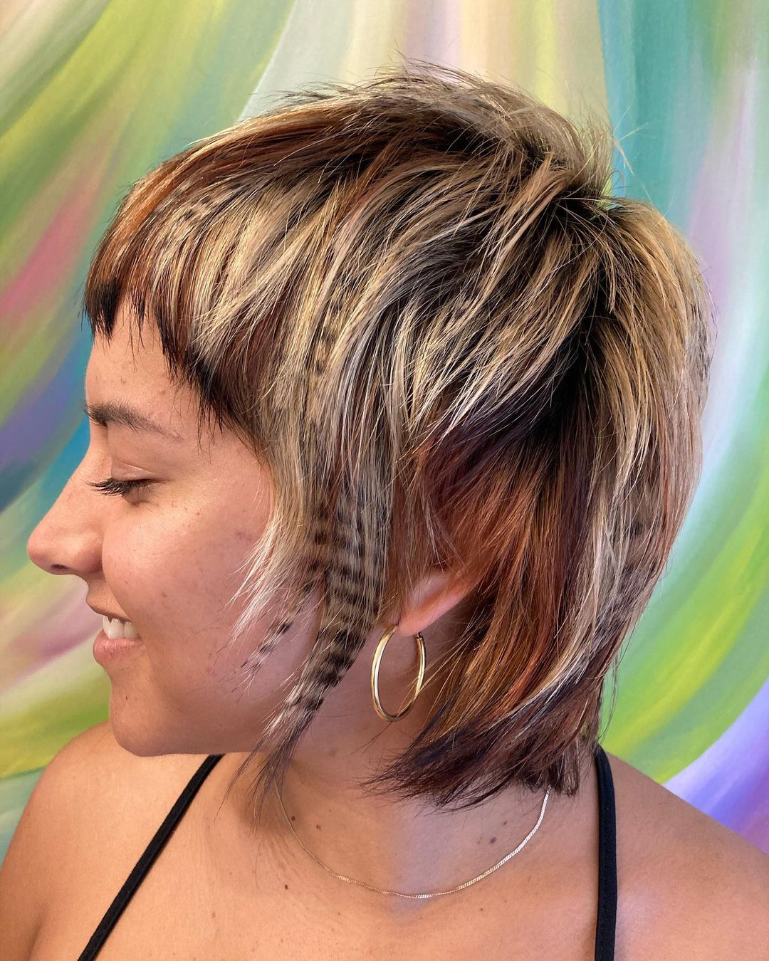 pixie mullet dark calico hair with raccoon tail stripes