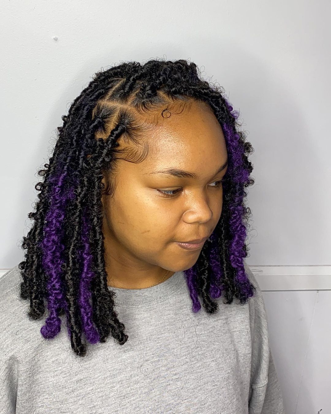 purple highlights on butterfly locs