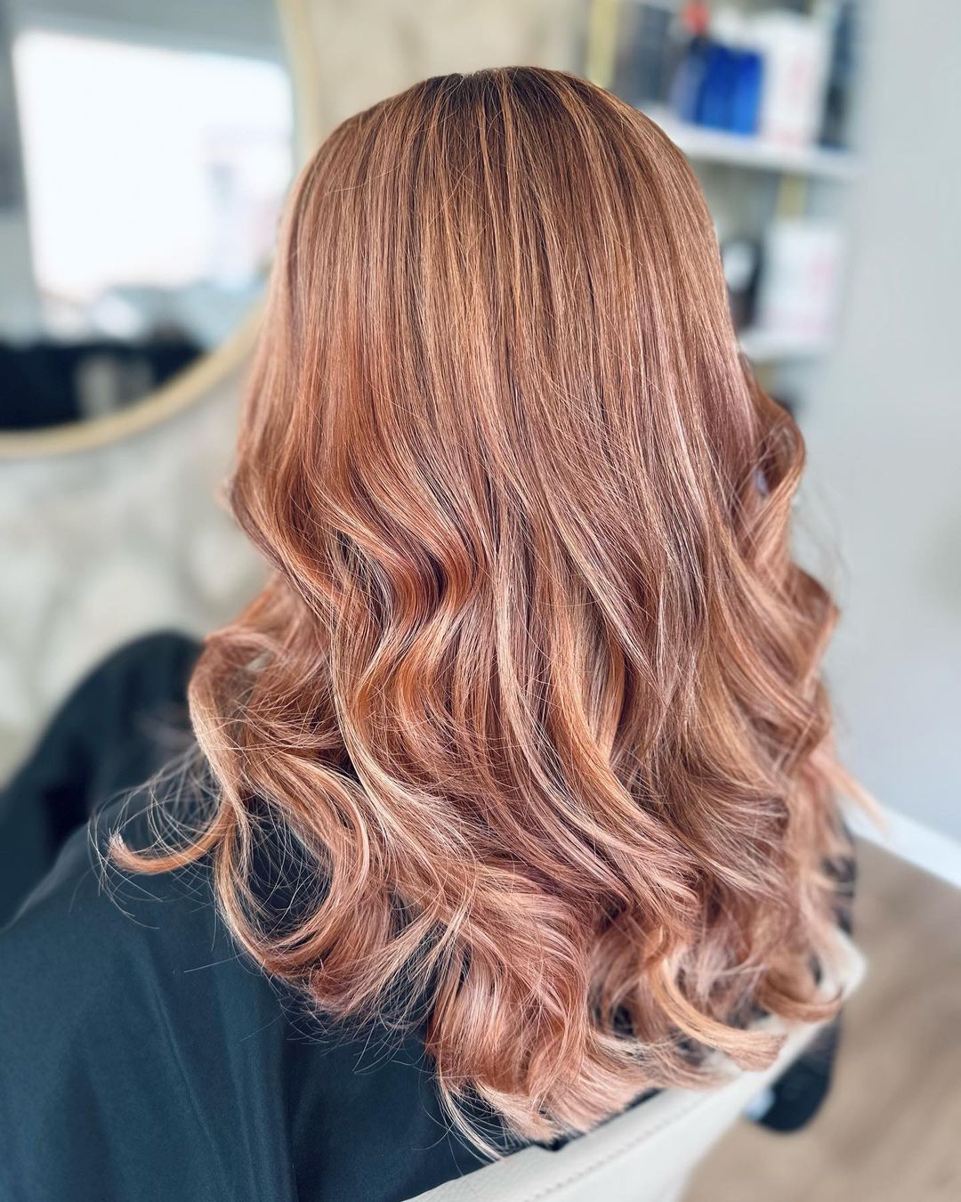 balayage or rose ondulations douces