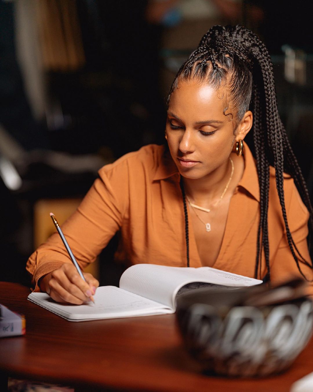 sleek criss-cross fulani braids into a high ponytail Alicia Keys