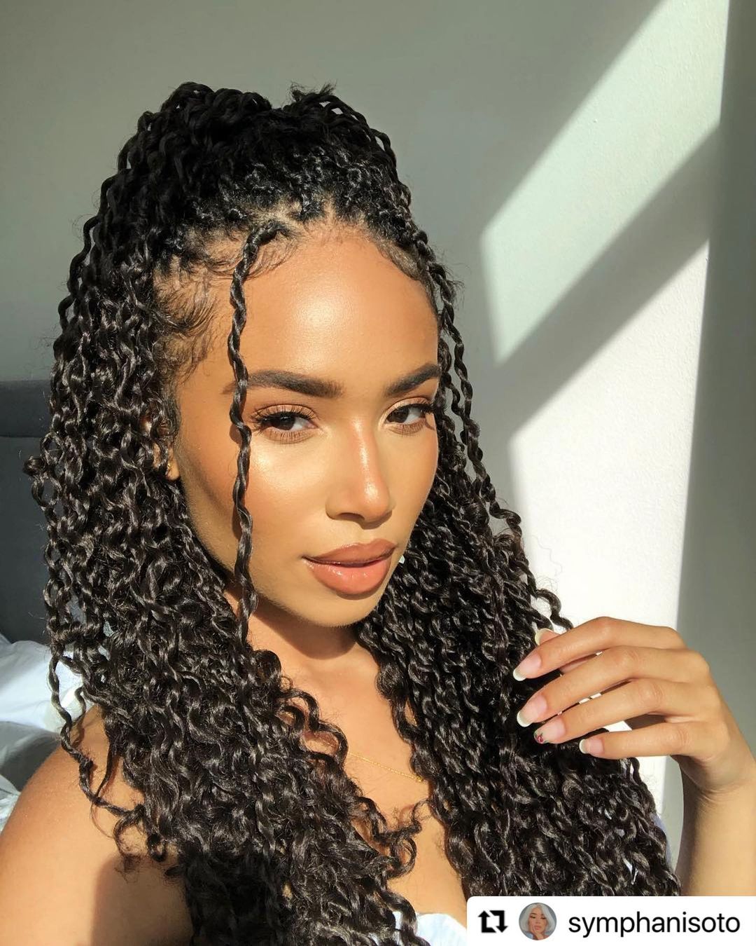 small passion twists half-up hairstyle