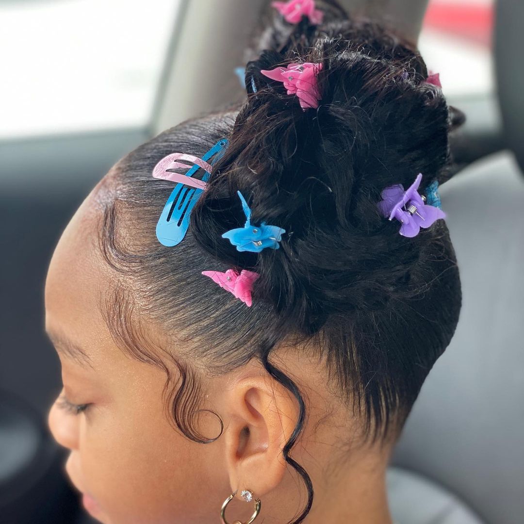 space buns with butterfly clips