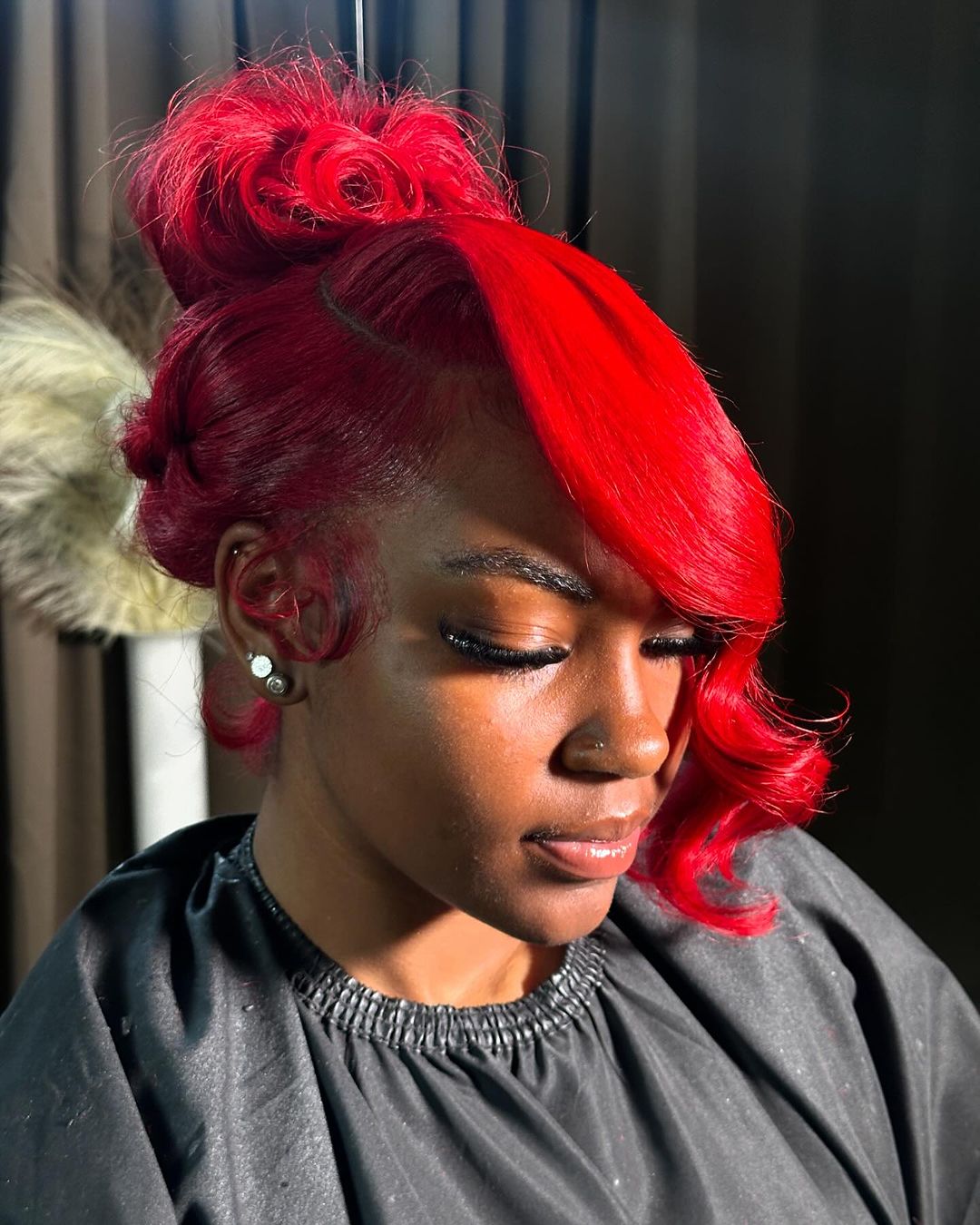 vivid red side part quick weave updo