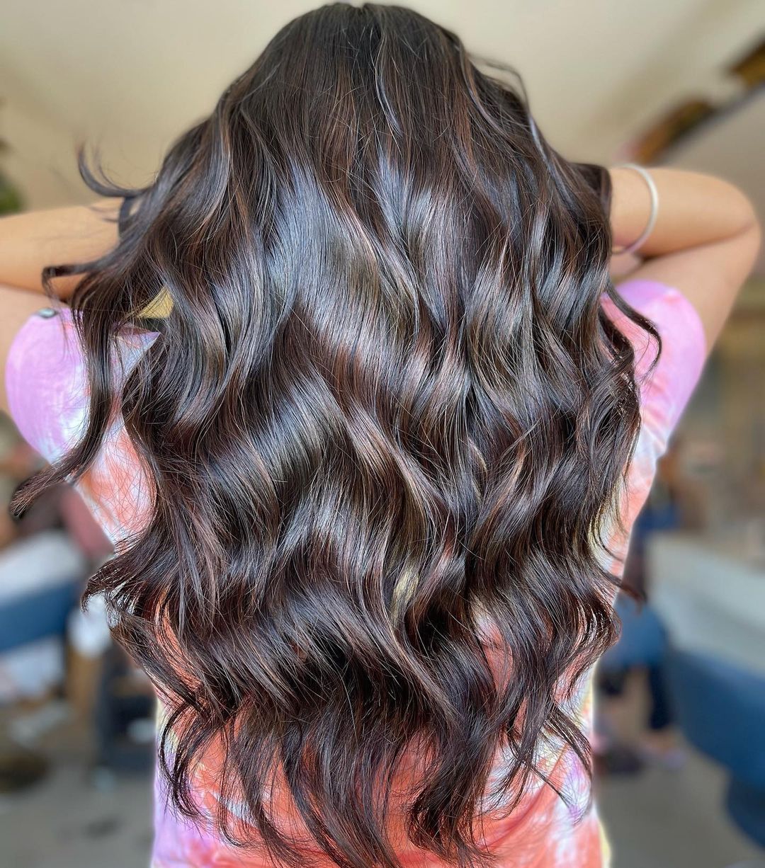 warm chocolate brown hair with subtle metallic twist