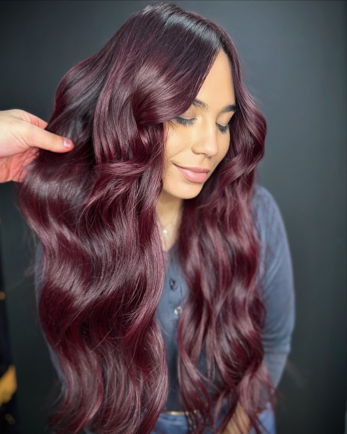 glossy dark burgundy hair