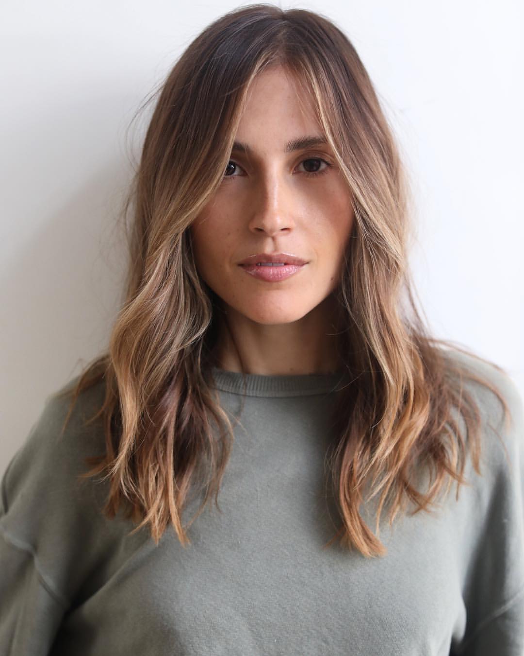 shoulder-length hair with face framing