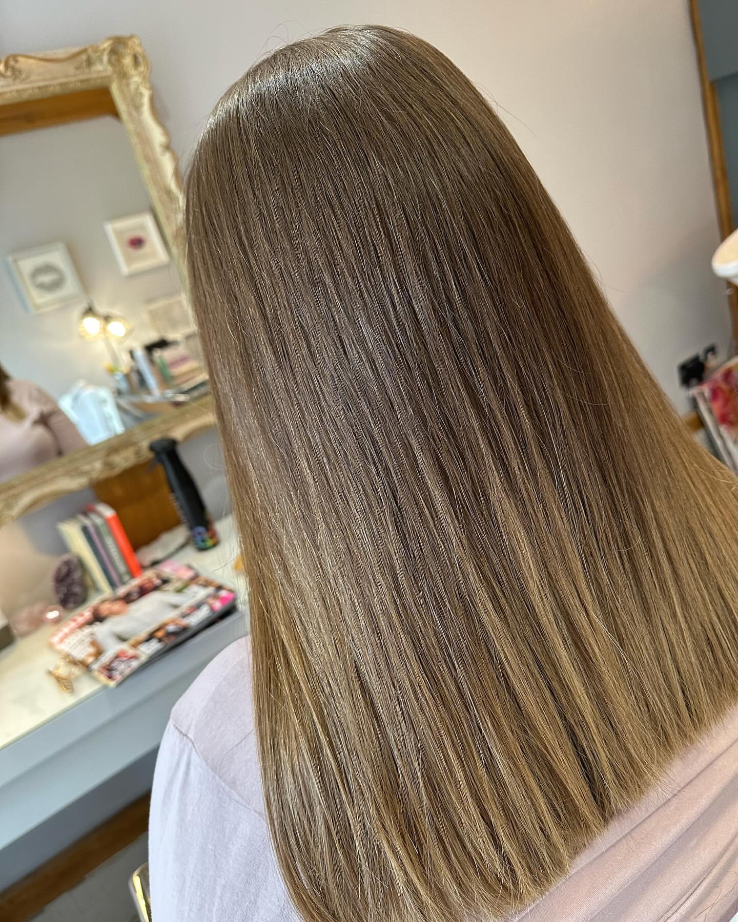 sleek straight hair with ghost layers