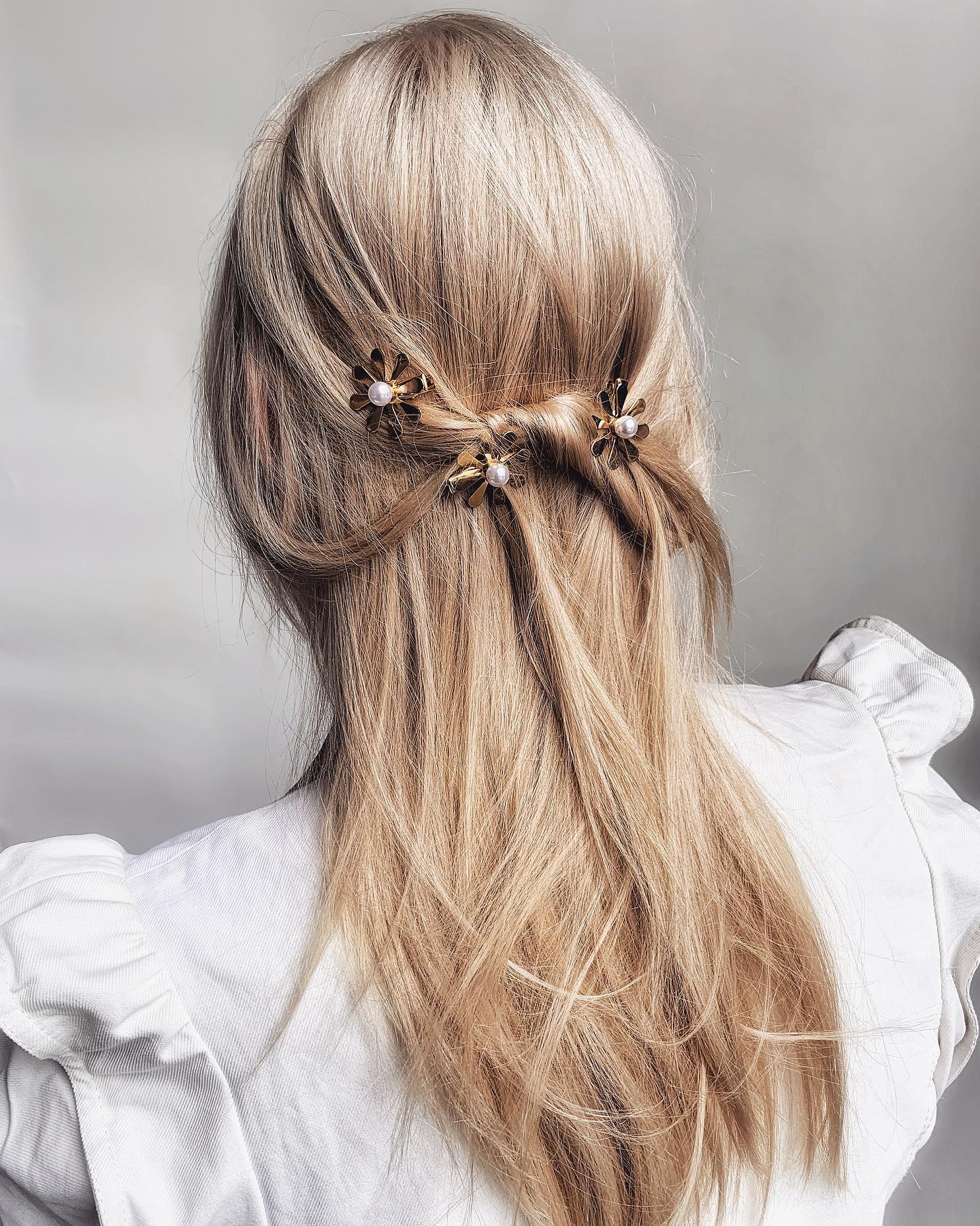 romantic half-up half-down hair with pins